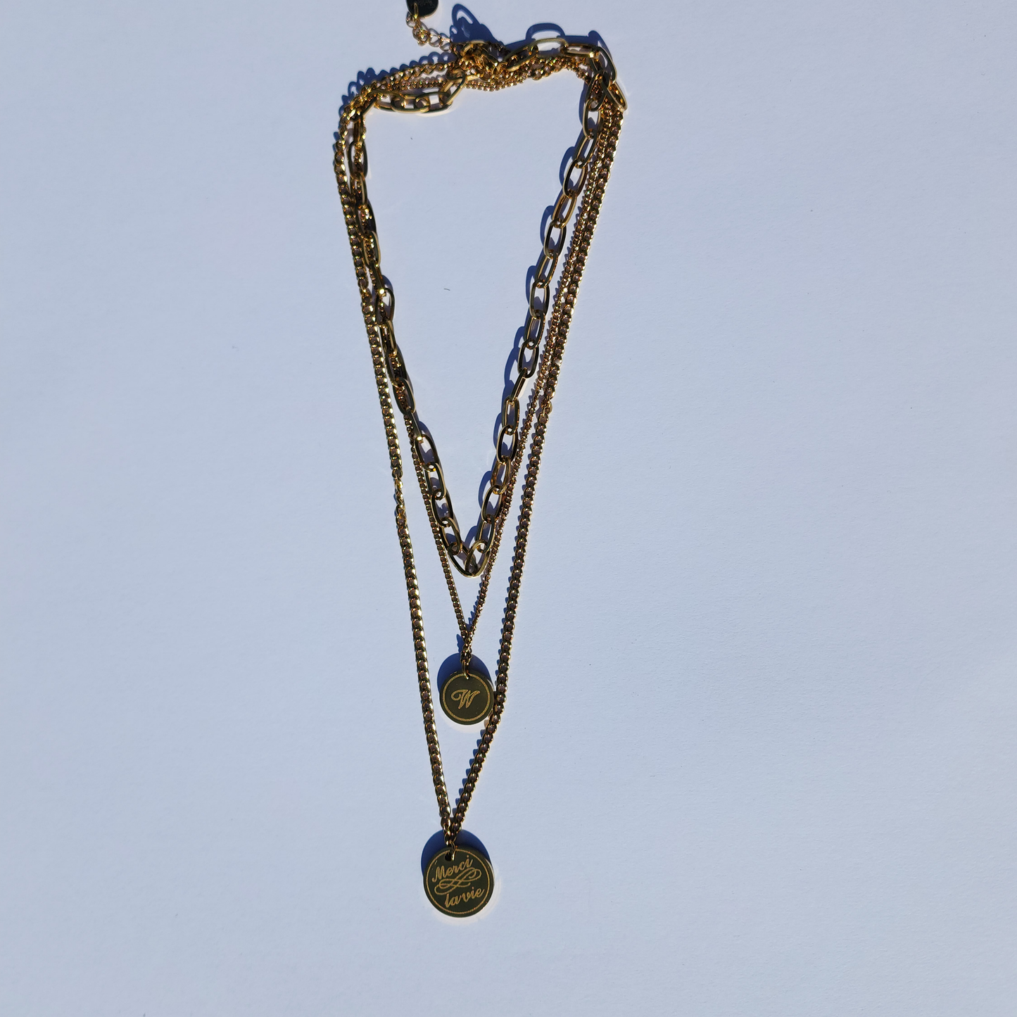 W Empress Necklace – Layered Gold-Toned Trio with Initial & Merci La Vie Pendant