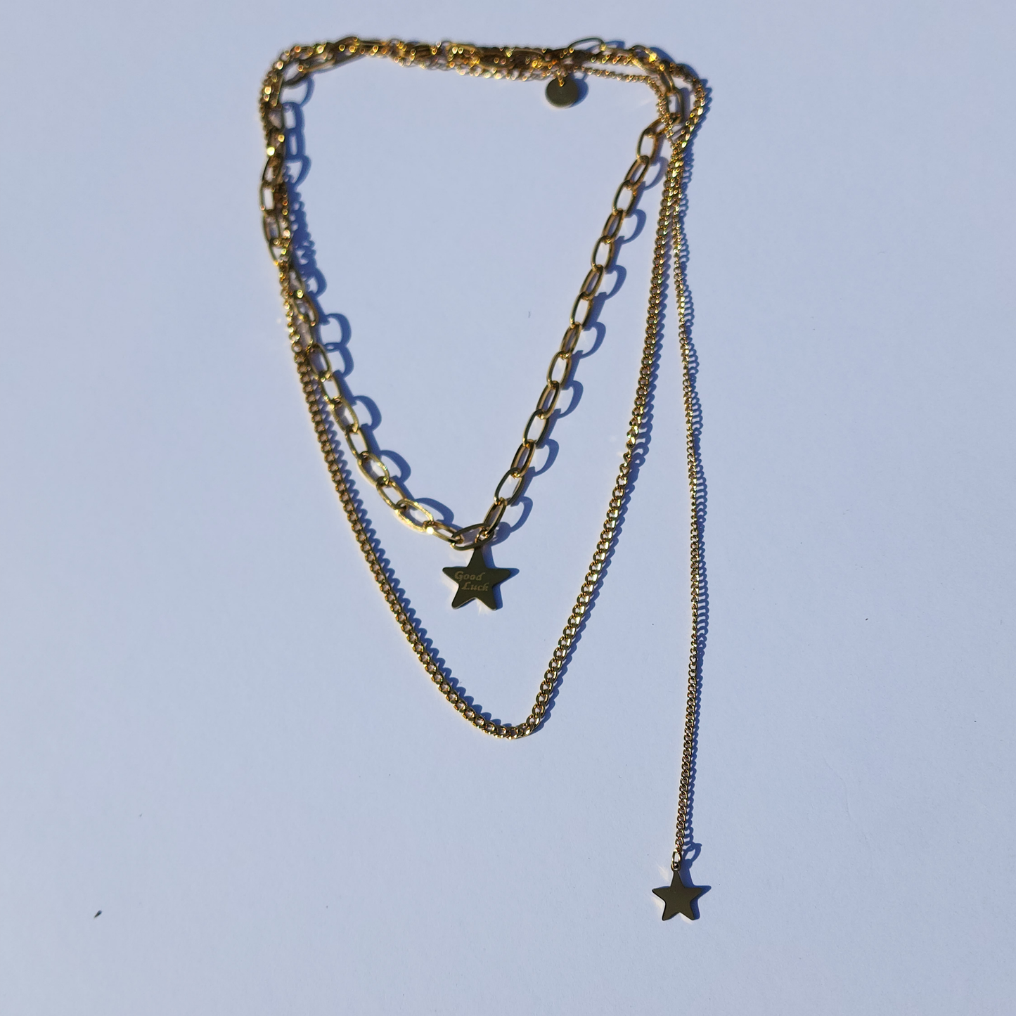 Stellar Voyage Necklace – Multi-Layered Gold-Toned Star Pendant Necklace