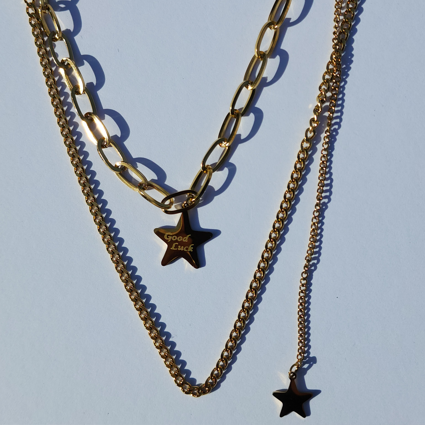 Stellar Voyage Necklace – Multi-Layered Gold-Toned Star Pendant Necklace