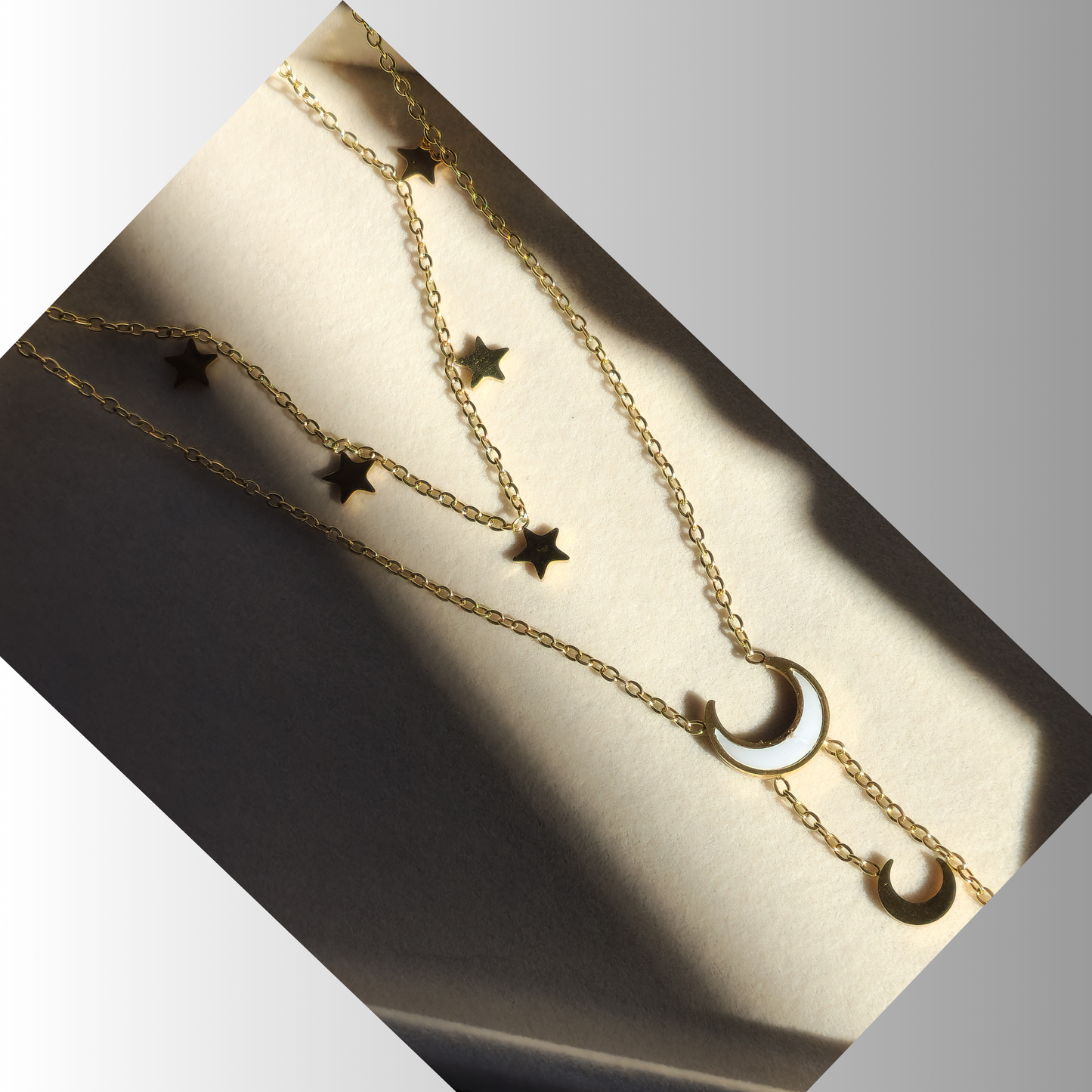 Twilight Threads Necklace – Multi-Layered Moon & Star Charm in 18K Gold Finish