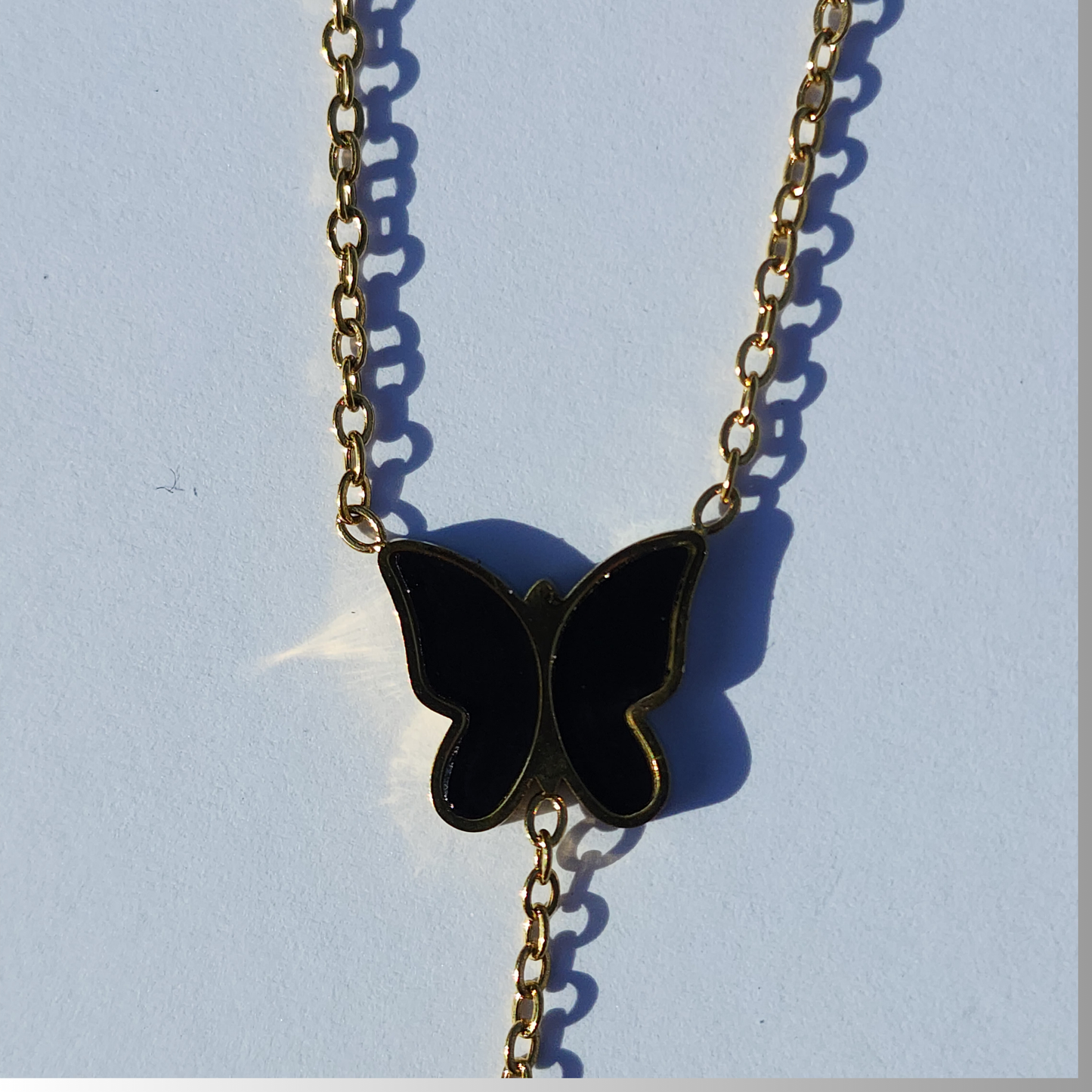 Midnight Muse Necklace – 18K Gold-Plated Lariat with Black Butterfly Charm