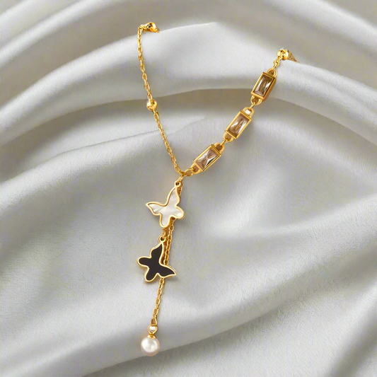 Starlit Balance Necklace – 18K Gold-Plated Lariat with Butterflies & Pearl Drop