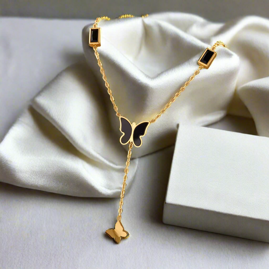 Midnight Muse Necklace – 18K Gold-Plated Lariat with Black Butterfly Charm